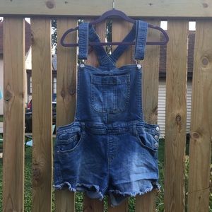 Overall shorts.